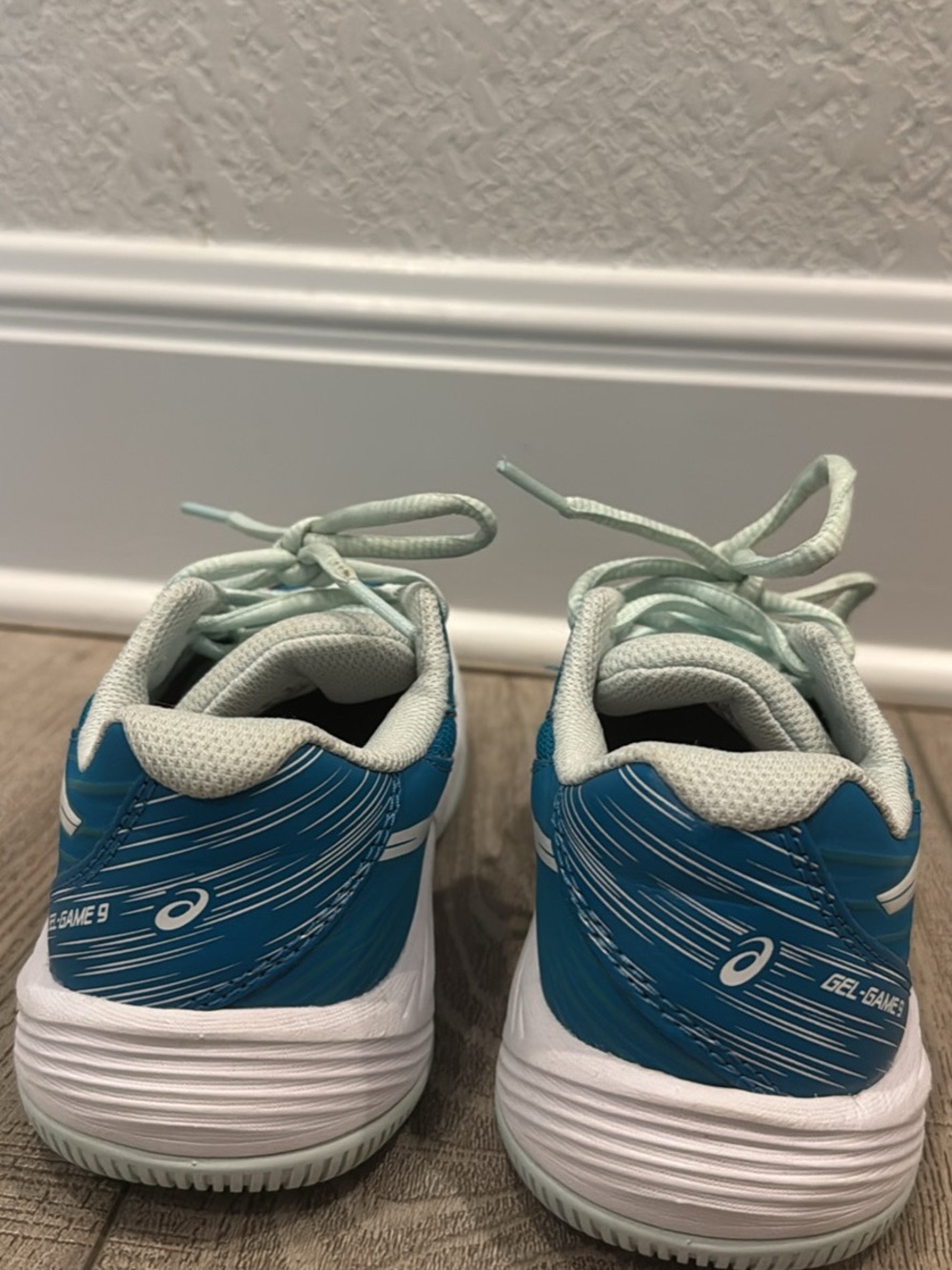 ASICS' teal GEL-Game volleyball/tennis court Shoes